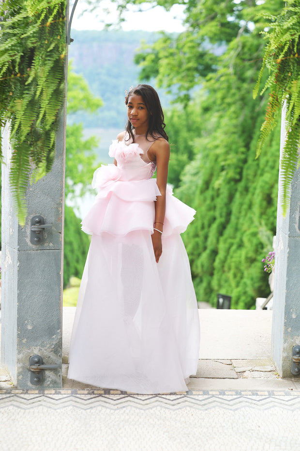 Girl in pink ruffle organza dress