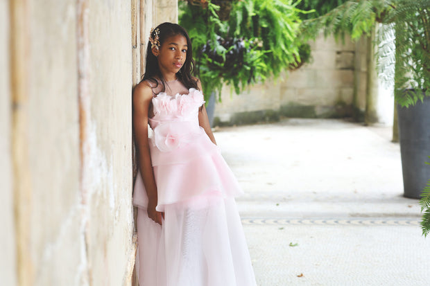 Girl in pink ruffle organza dress